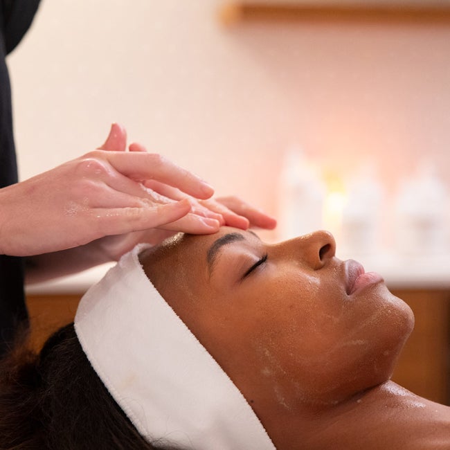 woman getting facial message